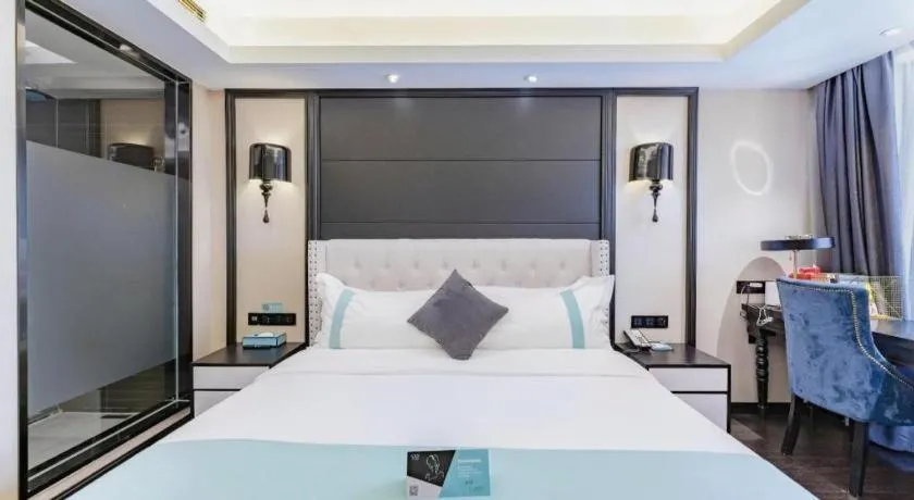 Bed in Xana Hotelle Zhengzhou North Passenger Terminal North University Town