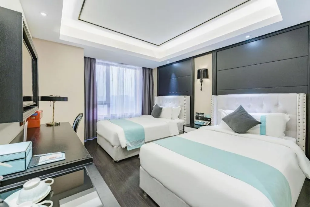 Bed in Xana Hotelle Zhengzhou North Passenger Terminal North University Town