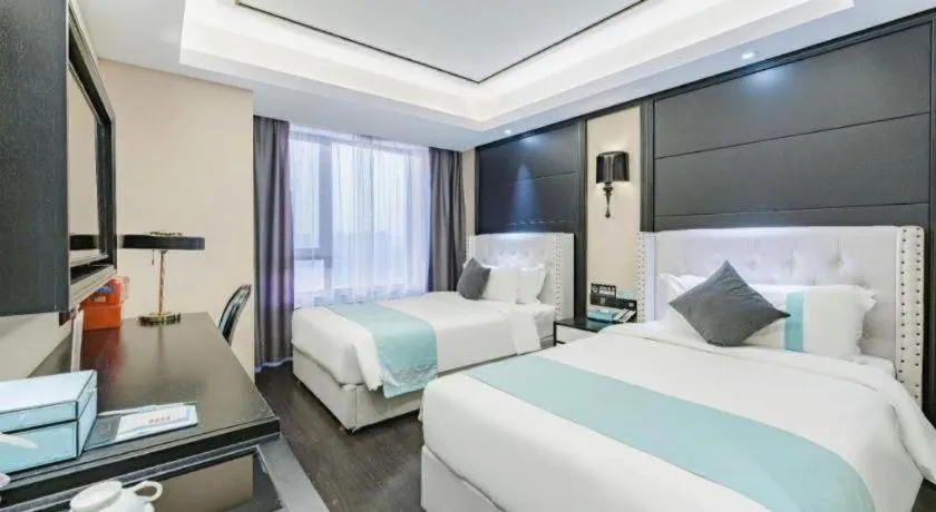 Bed in Xana Hotelle Zhengzhou North Passenger Terminal North University Town