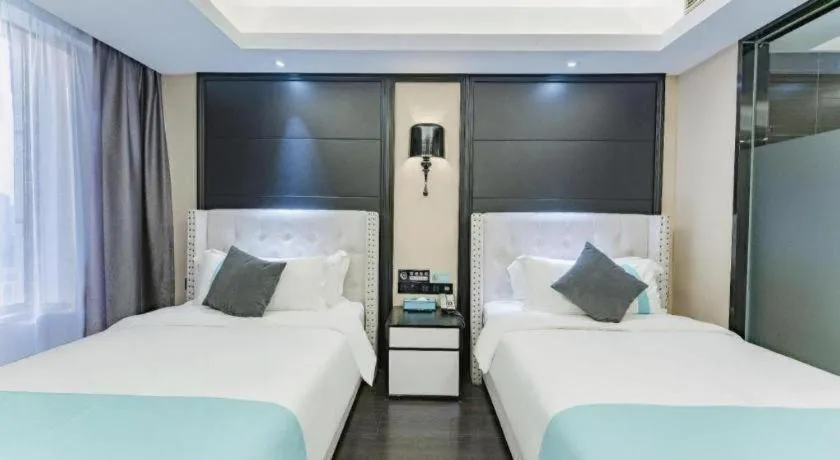 Bed in Xana Hotelle Zhengzhou North Passenger Terminal North University Town