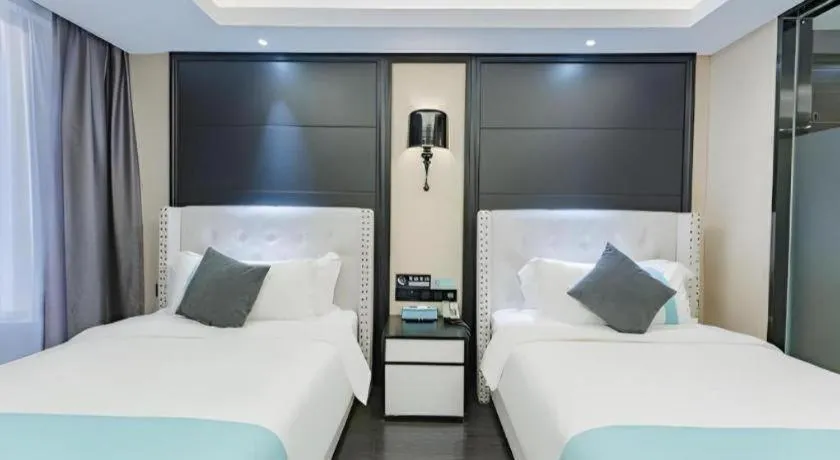 Bed in Xana Hotelle Zhengzhou North Passenger Terminal North University Town