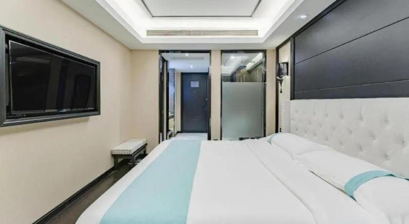 Bed in Xana Hotelle Zhengzhou North Passenger Terminal North University Town