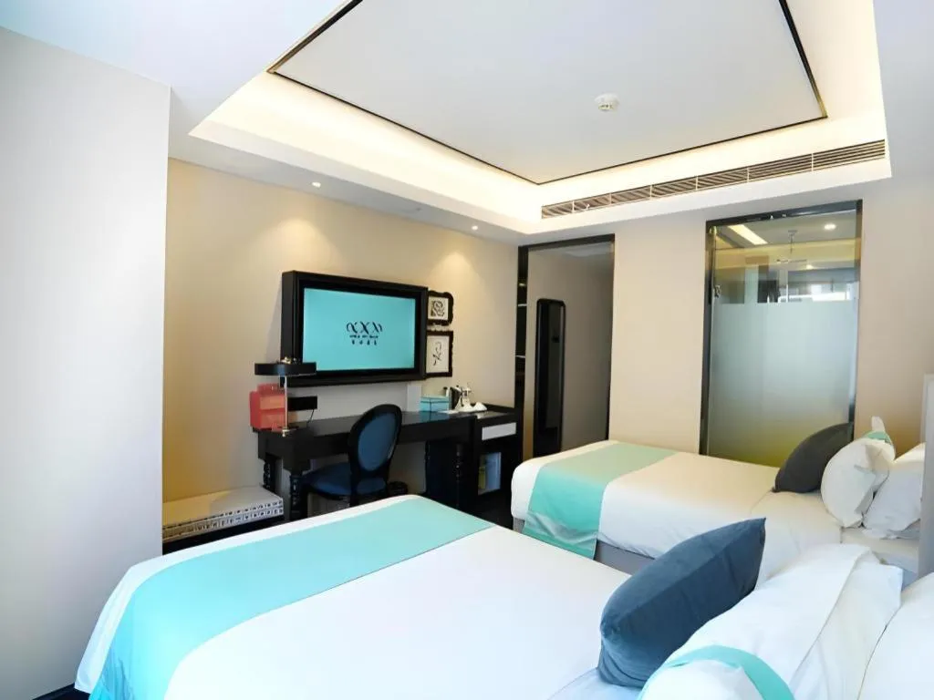 Bed in Xana Hotelle Zhengzhou North Passenger Terminal North University Town