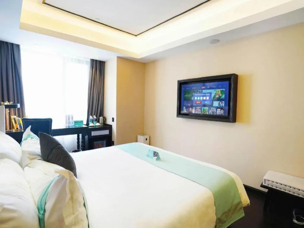 Bed in Xana Hotelle Zhengzhou North Passenger Terminal North University Town