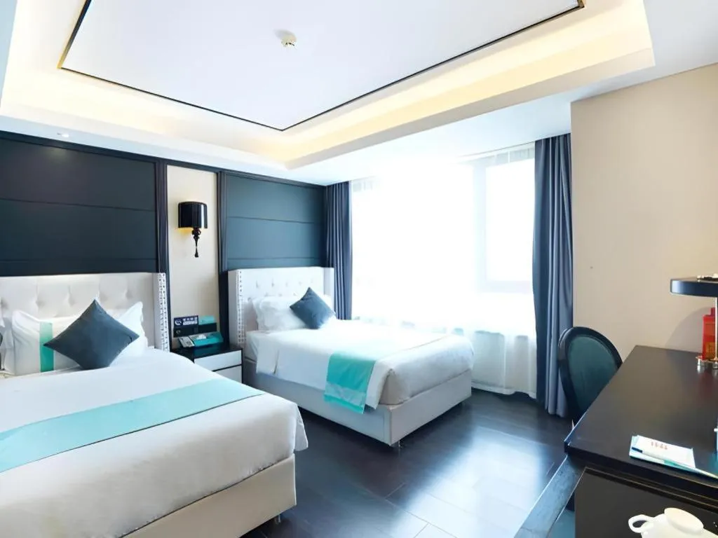 Bed in Xana Hotelle Zhengzhou North Passenger Terminal North University Town