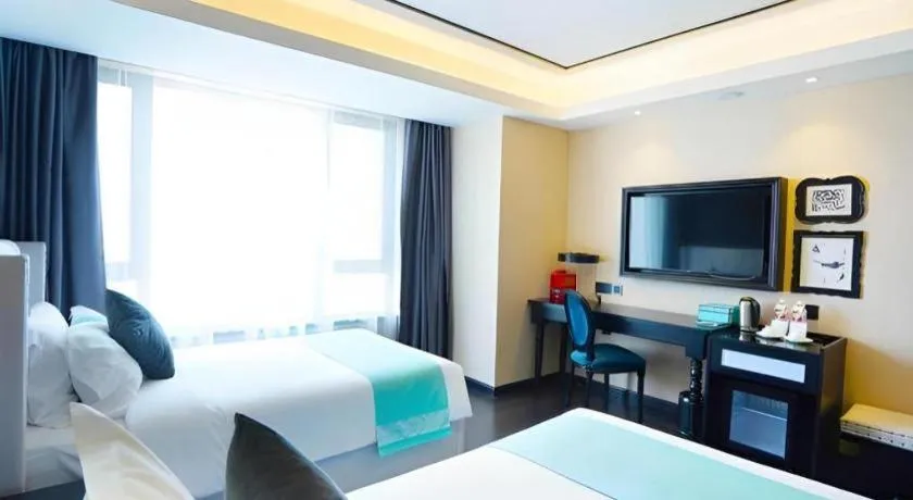 Bed in Xana Hotelle Zhengzhou North Passenger Terminal North University Town