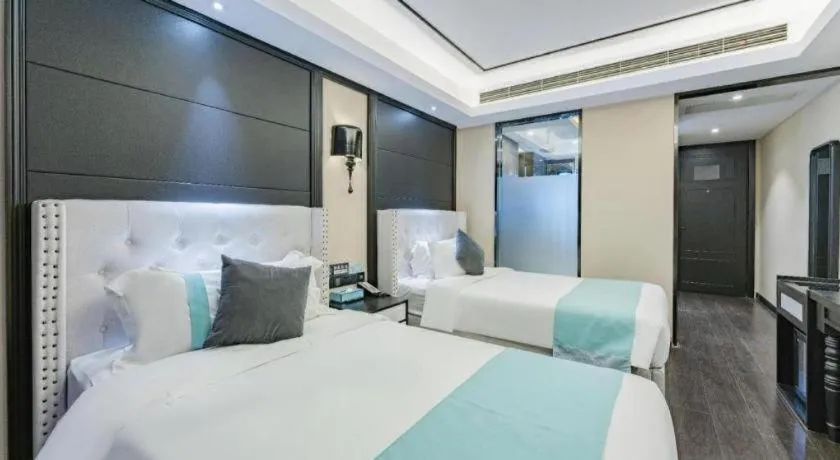 Bed in Xana Hotelle Zhengzhou North Passenger Terminal North University Town