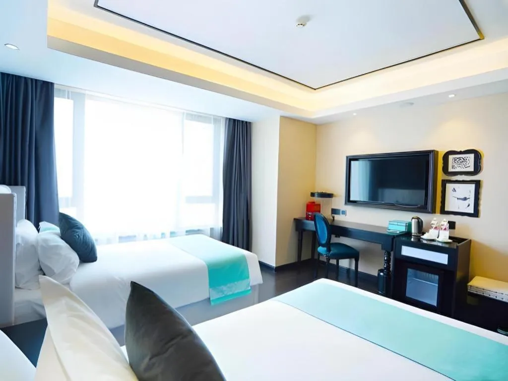 Bed in Xana Hotelle Zhengzhou North Passenger Terminal North University Town