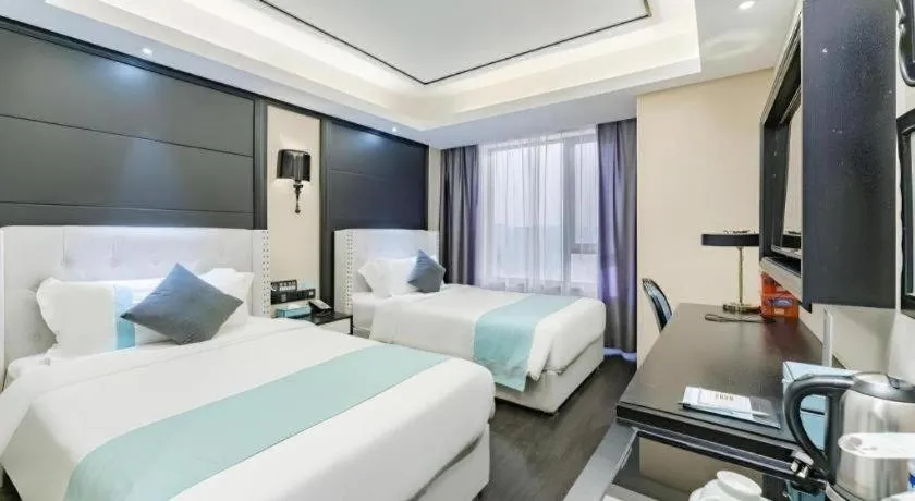 Bed in Xana Hotelle Zhengzhou North Passenger Terminal North University Town