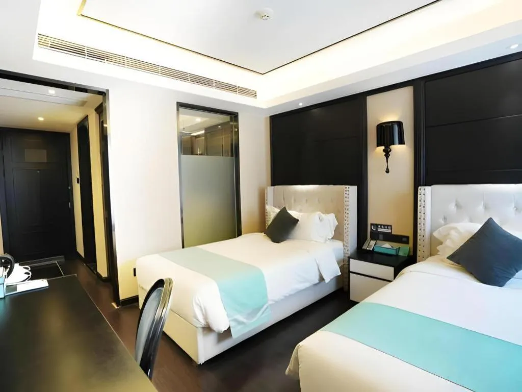 Bed in Xana Hotelle Zhengzhou North Passenger Terminal North University Town