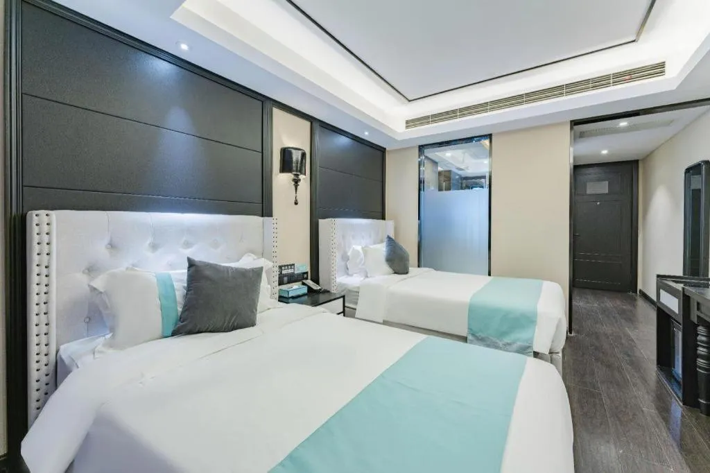 Bed in Xana Hotelle Zhengzhou North Passenger Terminal North University Town