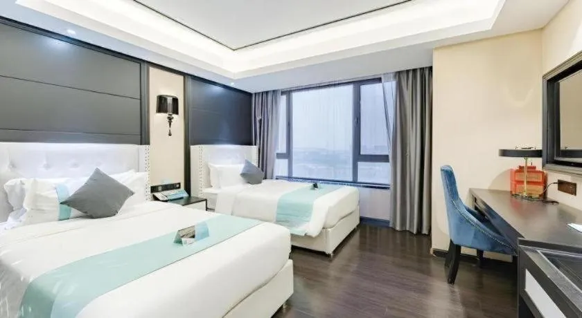 Bed in Xana Hotelle Zhengzhou North Passenger Terminal North University Town