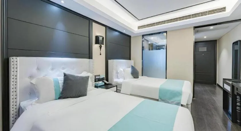 Bed in Xana Hotelle Zhengzhou North Passenger Terminal North University Town