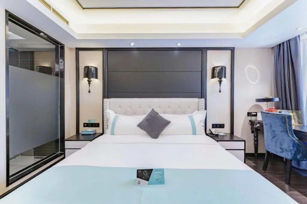 Bed in Xana Hotelle Zhengzhou North Passenger Terminal North University Town