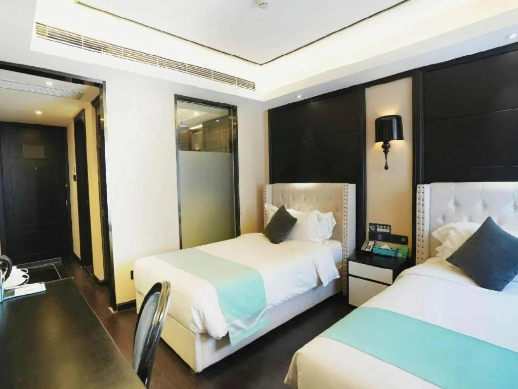 Bed in Xana Hotelle Zhengzhou North Passenger Terminal North University Town