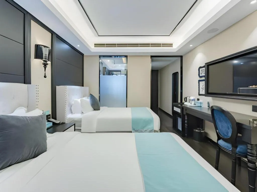 Bed in Xana Hotelle Zhengzhou North Passenger Terminal North University Town