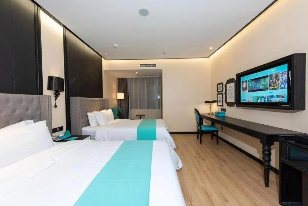 Bed in Xana Hotelle Chengdou Xindu Sanhechang Metro Station