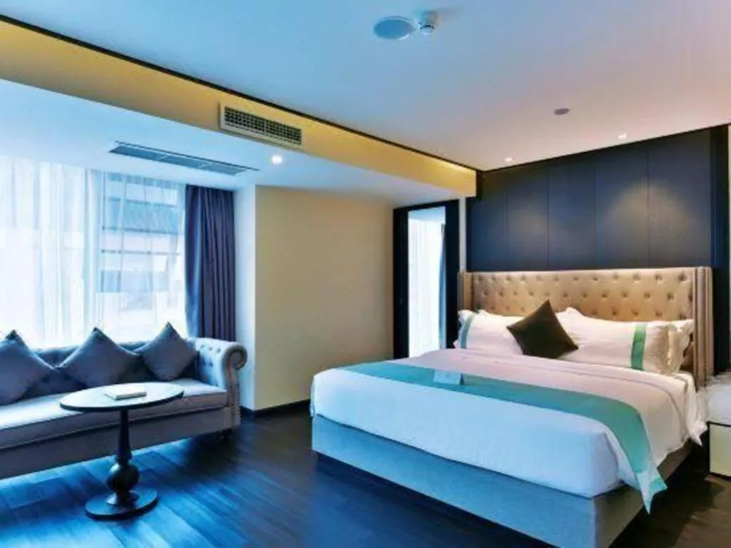 Bed in Xana Hotelle Chengdou Xindu Sanhechang Metro Station