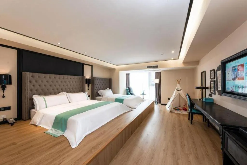 Bed in Xana Hotelle Chengdou Xindu Sanhechang Metro Station