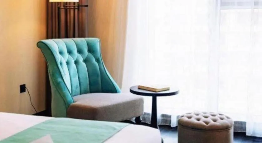 Bed in Xana Hotelle Chengdou Xindu Sanhechang Metro Station