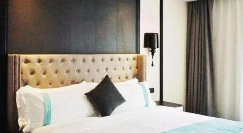 Bed in Xana Hotelle Chengdou Xindu Sanhechang Metro Station