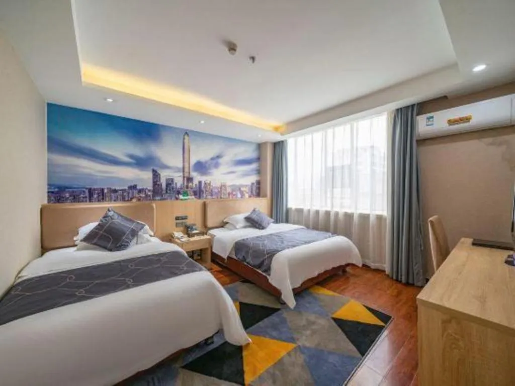 Bed in Chonpines Hotel Shenzhen Gongming Honghuashan Metro Station