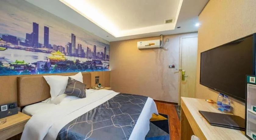 Bed in Chonpines Hotel Shenzhen Gongming Honghuashan Metro Station