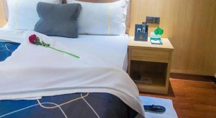 Bed in Chonpines Hotel Shenzhen Gongming Honghuashan Metro Station
