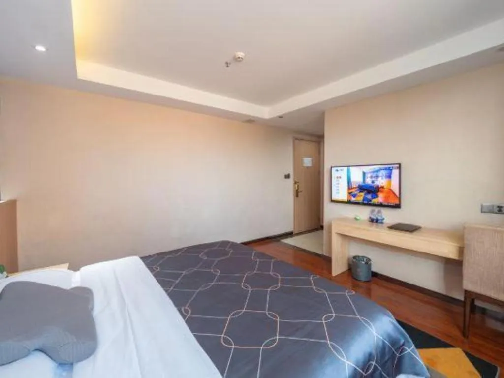 Bed in Chonpines Hotel Shenzhen Gongming Honghuashan Metro Station