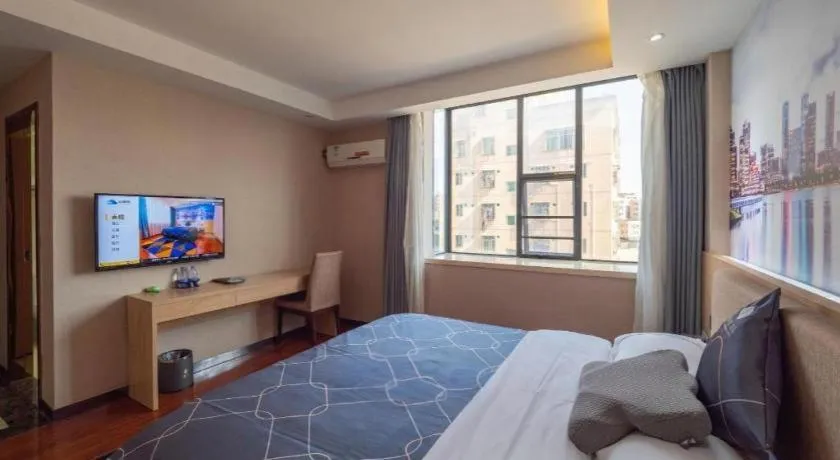 Bed in Chonpines Hotel Shenzhen Gongming Honghuashan Metro Station