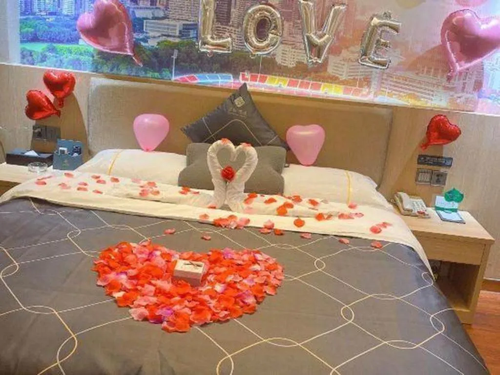 Bed in Chonpines Hotel Shenzhen Gongming Honghuashan Metro Station