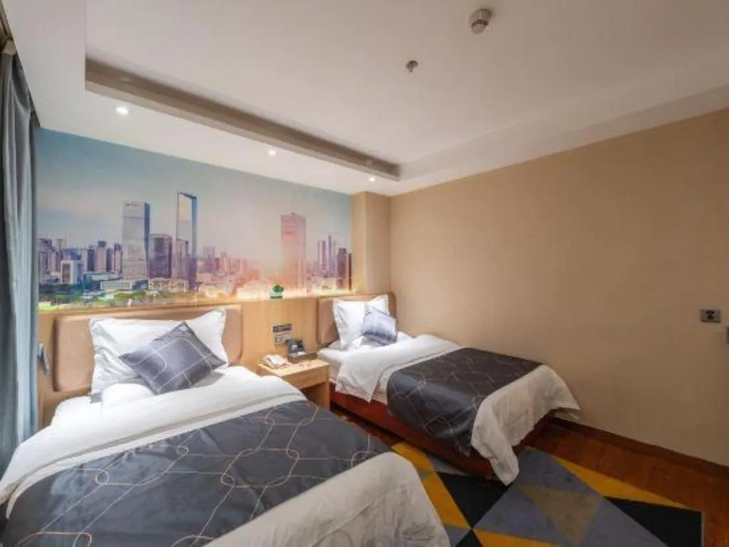 Bed in Chonpines Hotel Shenzhen Gongming Honghuashan Metro Station