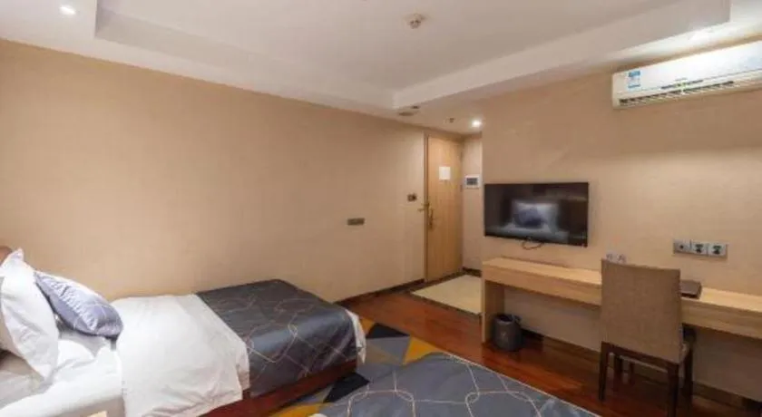 Bed in Chonpines Hotel Shenzhen Gongming Honghuashan Metro Station