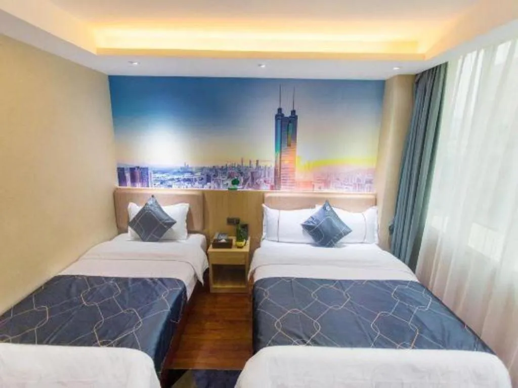 Bed in Chonpines Hotel Shenzhen Gongming Honghuashan Metro Station