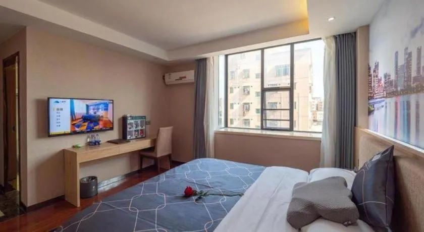 Bed in Chonpines Hotel Shenzhen Gongming Honghuashan Metro Station