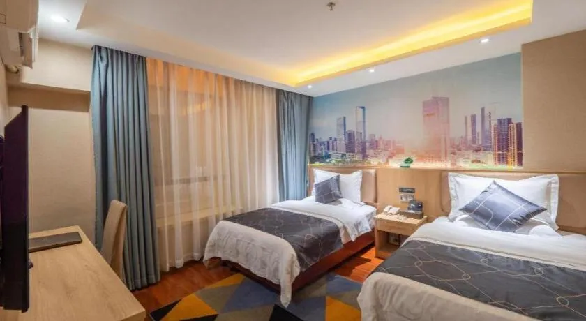 Bed in Chonpines Hotel Shenzhen Gongming Honghuashan Metro Station