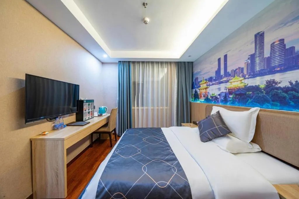 Bed in Chonpines Hotel Shenzhen Gongming Honghuashan Metro Station