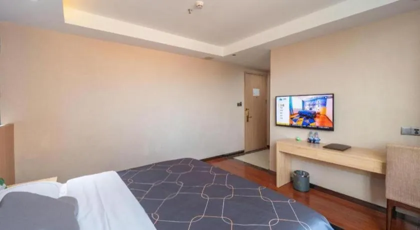 Bed in Chonpines Hotel Shenzhen Gongming Honghuashan Metro Station