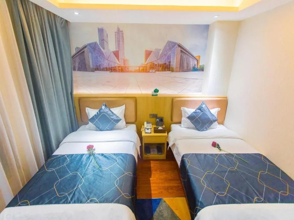 Bed in Chonpines Hotel Shenzhen Gongming Honghuashan Metro Station