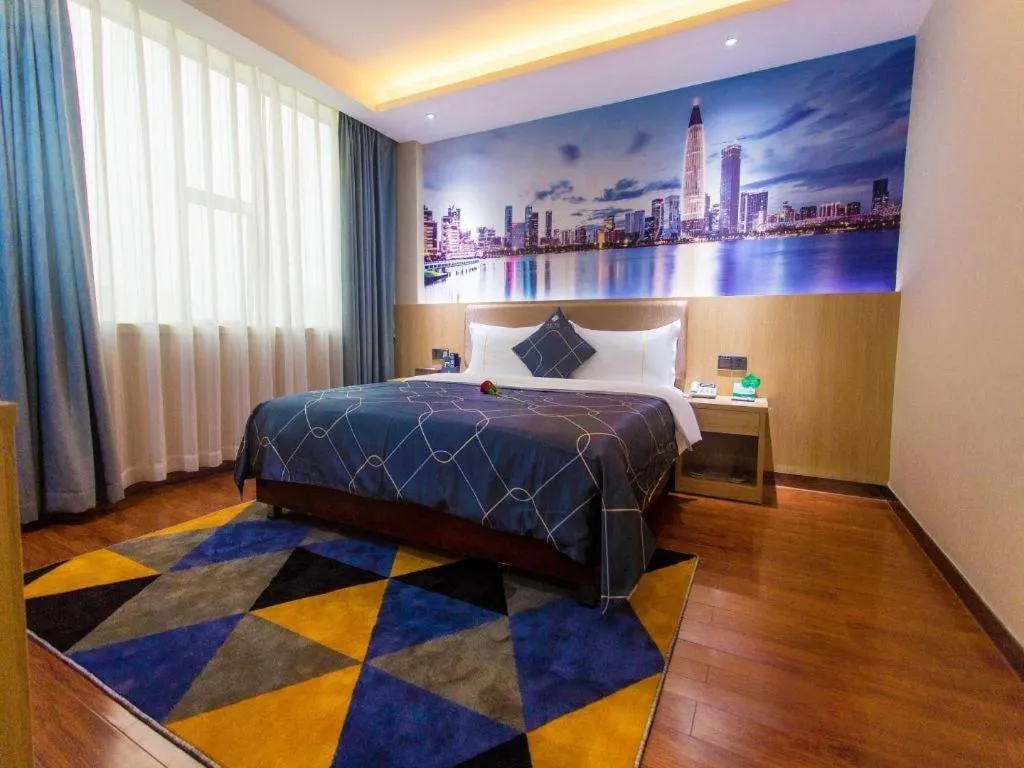 Bed in Chonpines Hotel Shenzhen Gongming Honghuashan Metro Station