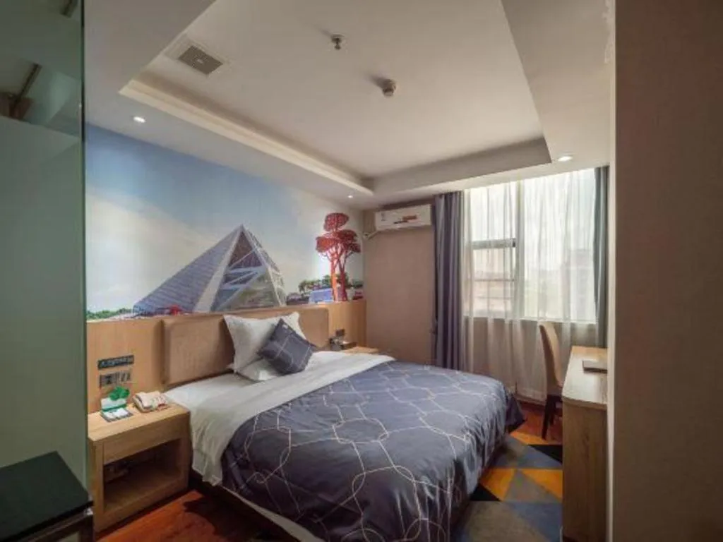 Bed in Chonpines Hotel Shenzhen Gongming Honghuashan Metro Station