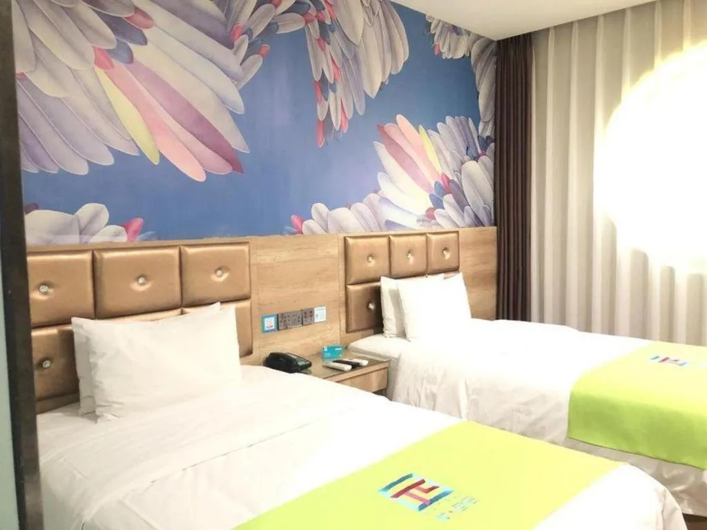 Bed in PAI Hotel·Linfen Hongdong Lily Town