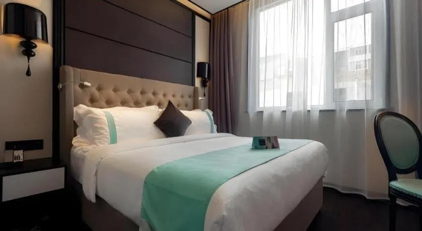 Bed in Xana Hotelle·Lianyungang Donghai