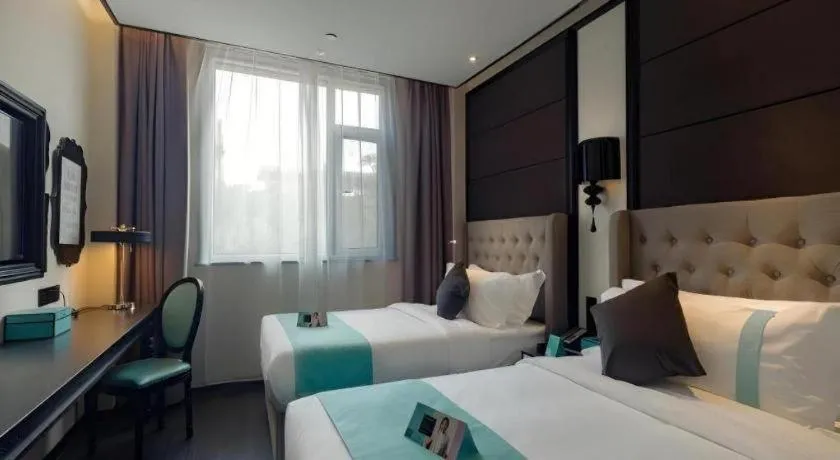 Bed in Xana Hotelle·Lianyungang Donghai