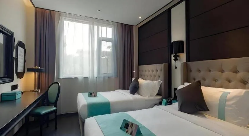 Bed in Xana Hotelle·Lianyungang Donghai