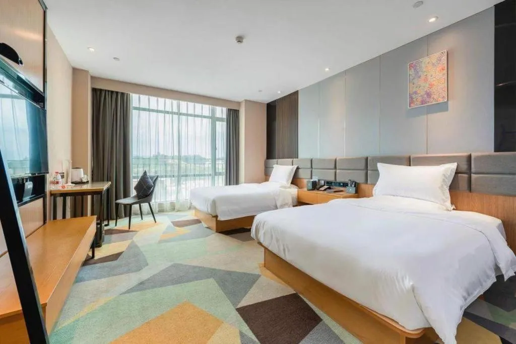 Bed in Chonpines Hotel Guangzhou Sunac Cultural and Tourism City Shiling