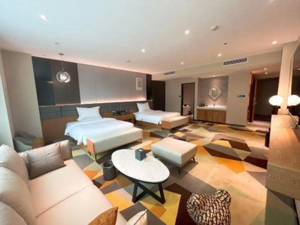 Bed in Chonpines Hotel Guangzhou Sunac Cultural and Tourism City Shiling