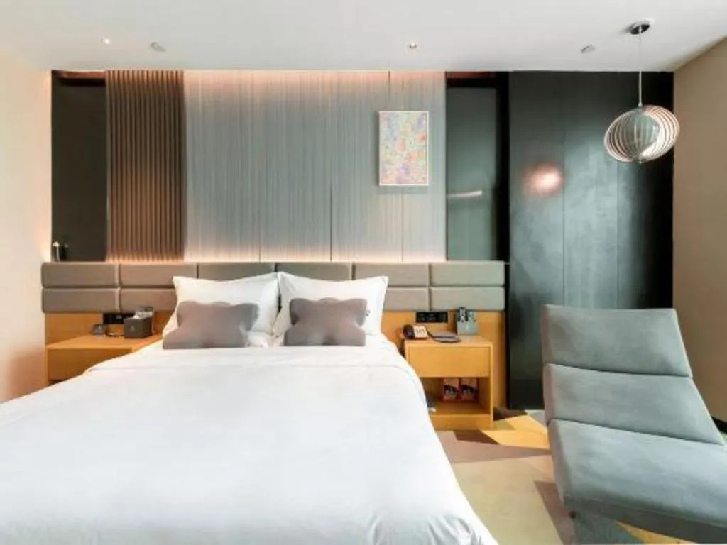 Bed in Chonpines Hotel Guangzhou Sunac Cultural and Tourism City Shiling