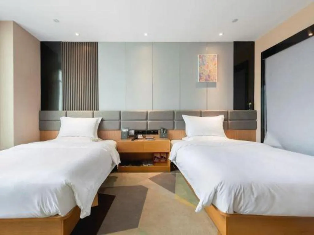 Bed in Chonpines Hotel Guangzhou Sunac Cultural and Tourism City Shiling