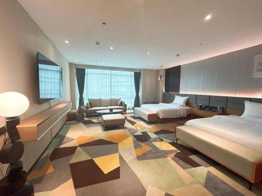 Bed in Chonpines Hotel Guangzhou Sunac Cultural and Tourism City Shiling